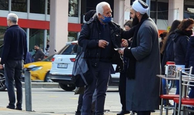 İzmir'de cüppeli şahıslar, yılbaşı kutlamalarına karşı bildiri dağıttı